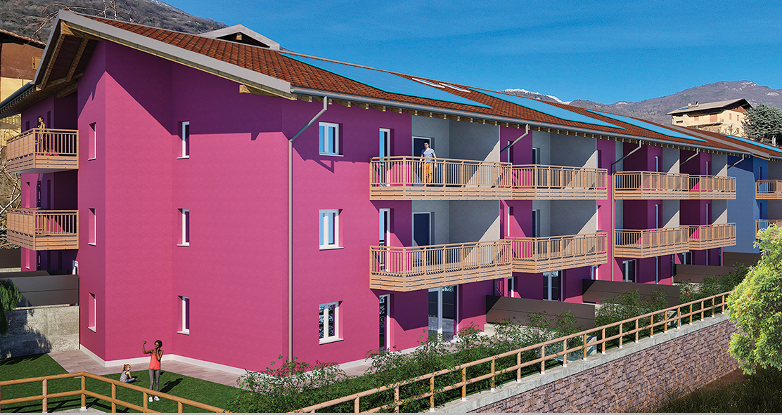 Render della Residenza Alessia a Pedersano: facciata fucsia con balconi in legno e giardino